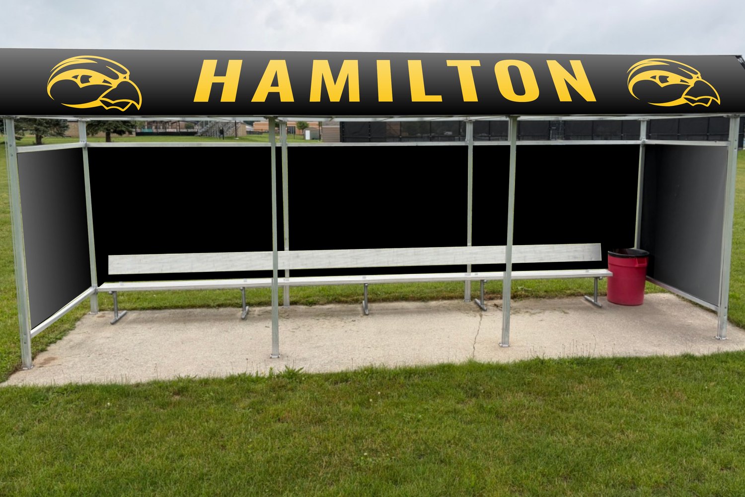 Hamilton soccer team enclosure with the Hawkeye wordmark across the roof